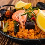 Is there a tradition to serve and eat paella?